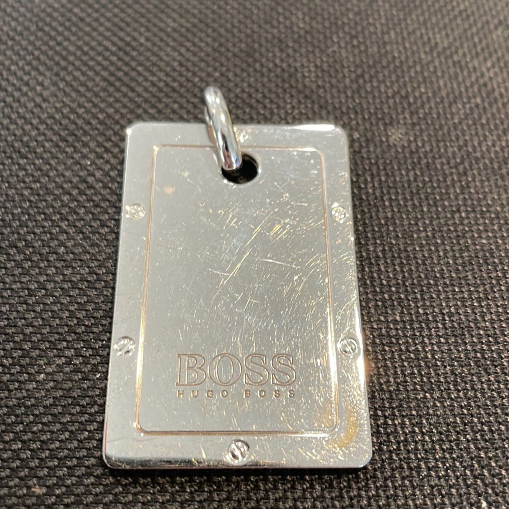Used Hugo boss silver dog tag